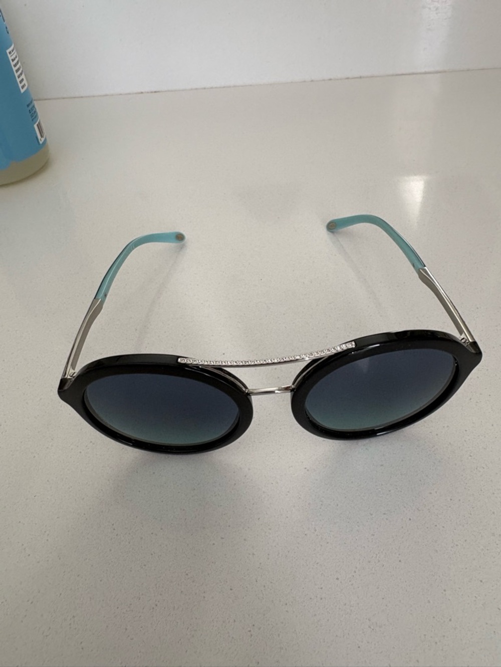 Tiffany & Co. Black Round Sunglasses with Aqua Temple Tips